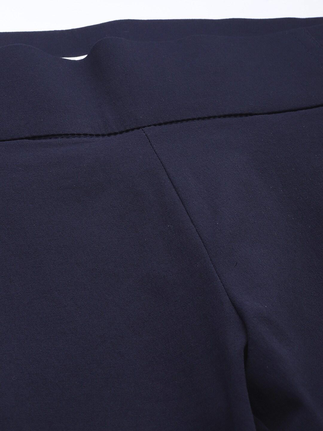 A Women Wearing Columbia Women Navy Blue Anytime Casual Pull On Pant (Sun Protection)
