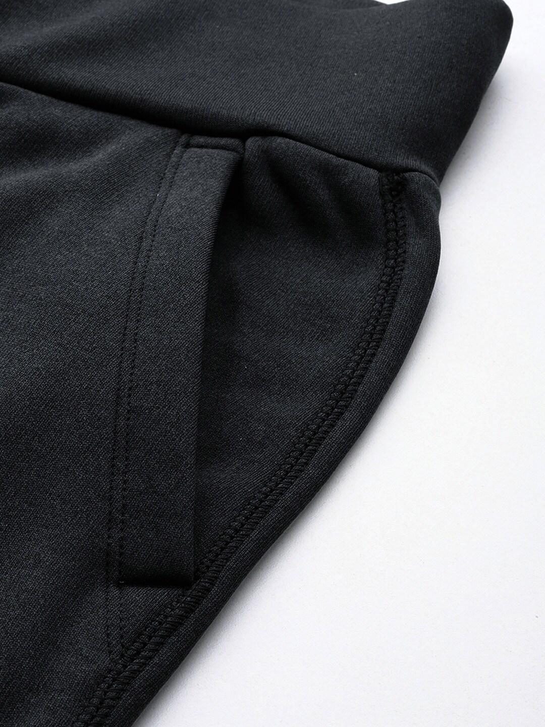 A Women Wearing Columbia Women Black Col Hike Tech Fleece Bottom