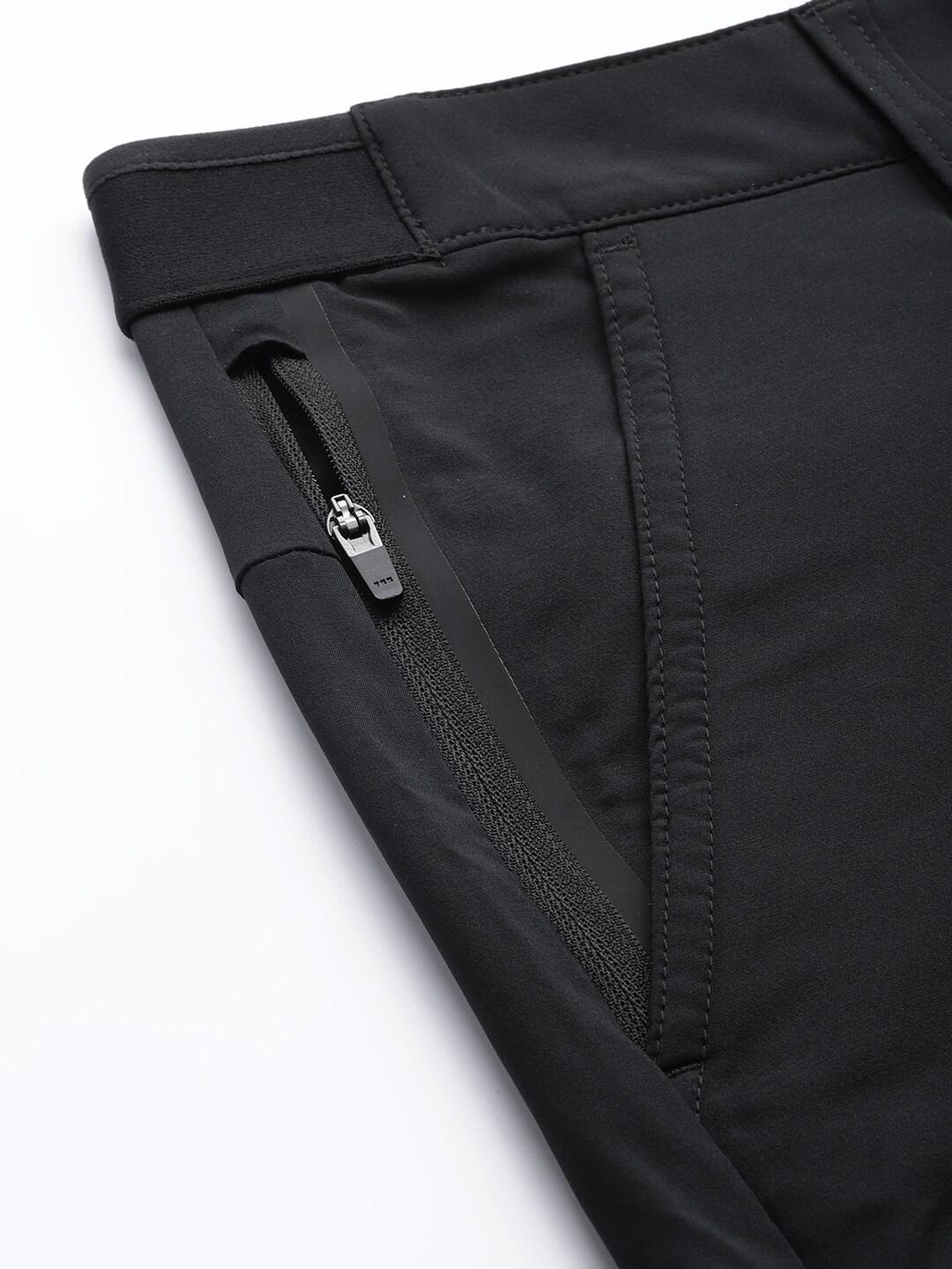A Men Wearing Columbia Men Black Tech Trail Short (Sun Protection)
