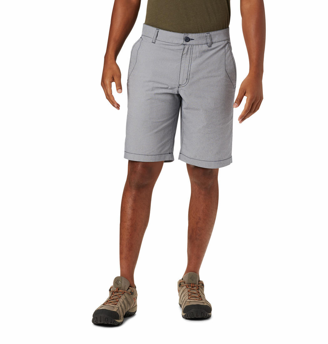 A Men Wearing Columbia Men Blue Outdoor Elements Chambray Short