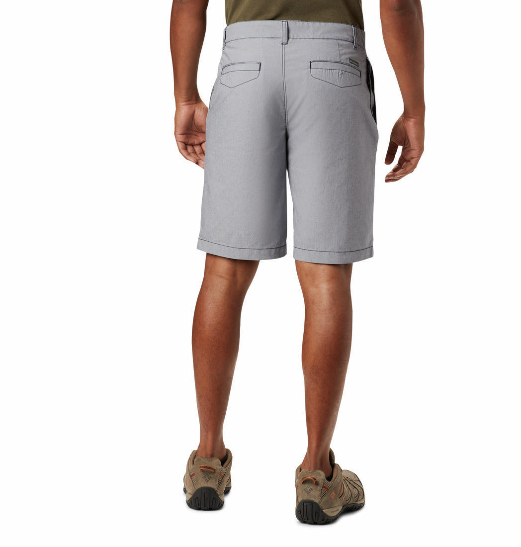 A Men Wearing Columbia Men Blue Outdoor Elements Chambray Short