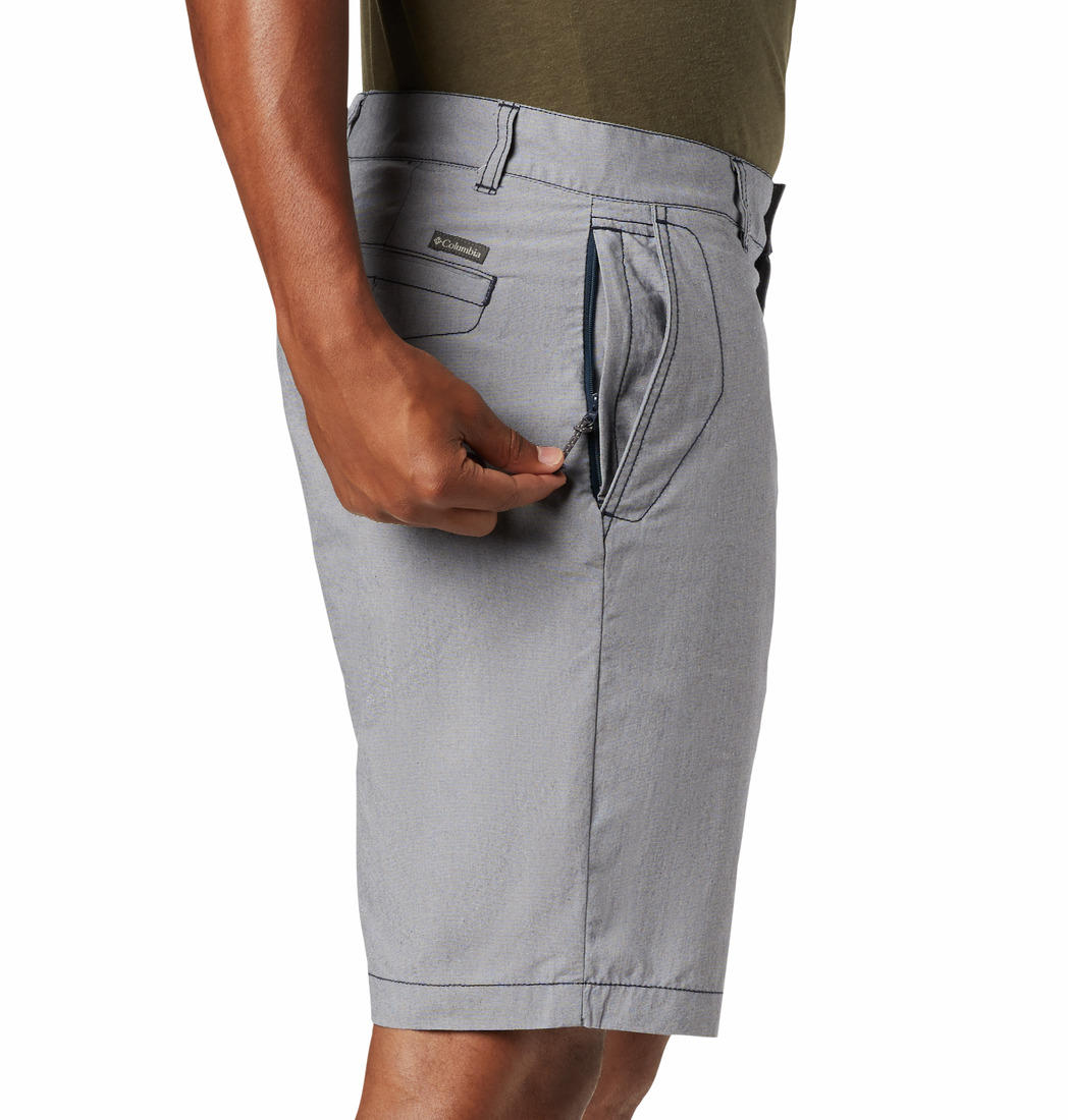 A Men Wearing Columbia Men Blue Outdoor Elements Chambray Short
