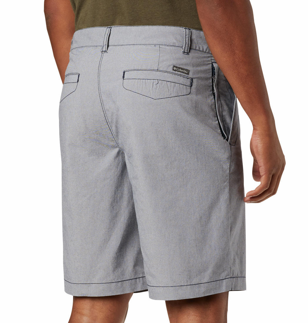A Men Wearing Columbia Men Blue Outdoor Elements Chambray Short