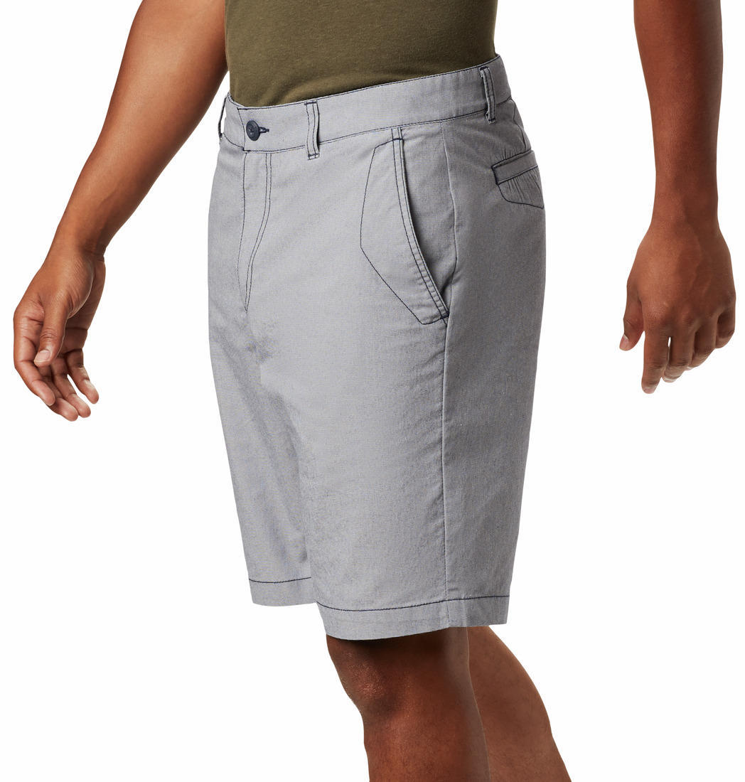 A Men Wearing Columbia Men Blue Outdoor Elements Chambray Short