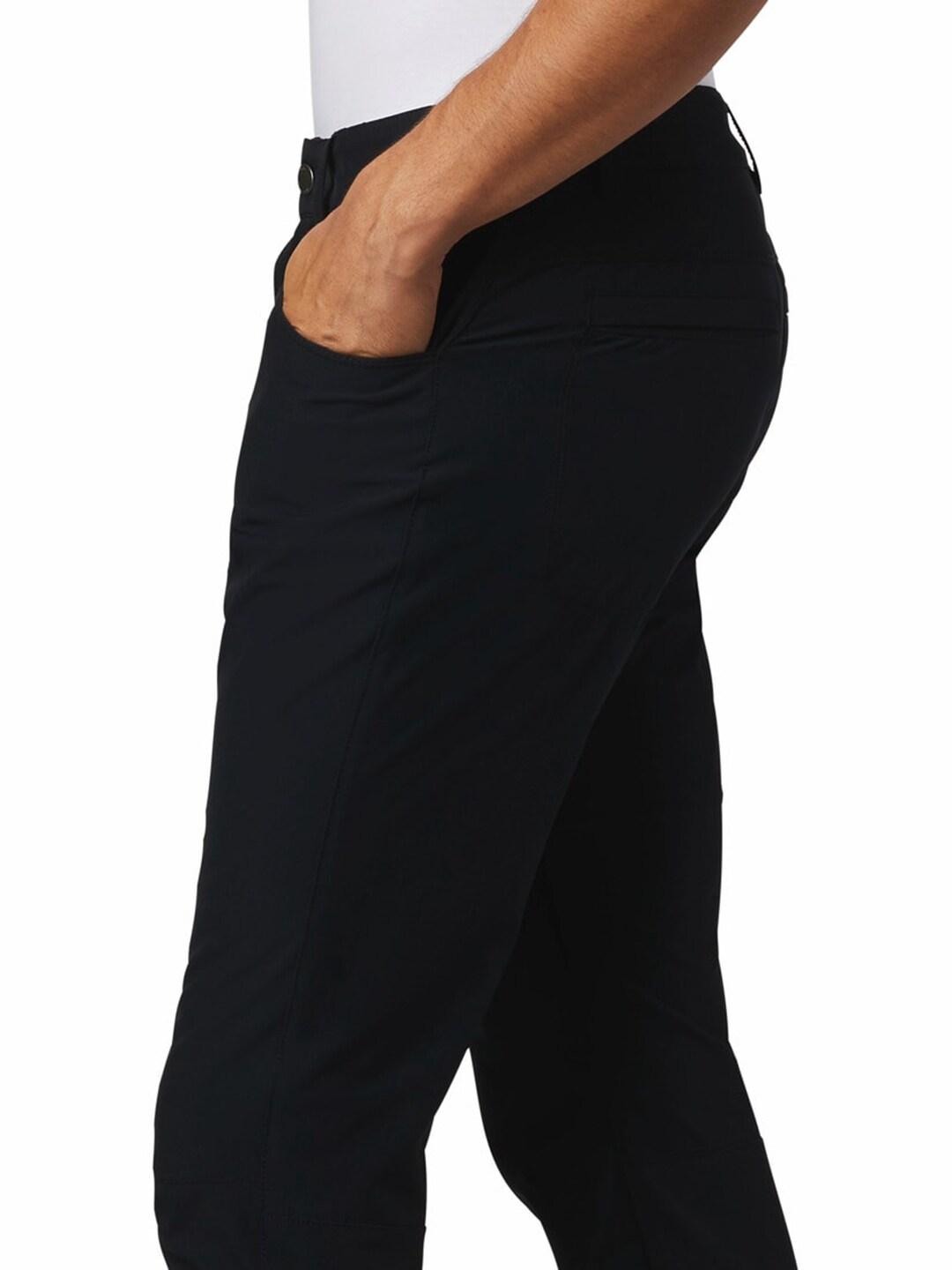 A Men Wearing Columbia Men Black Outdoor Elements Stretch Pant (Sun Protection)