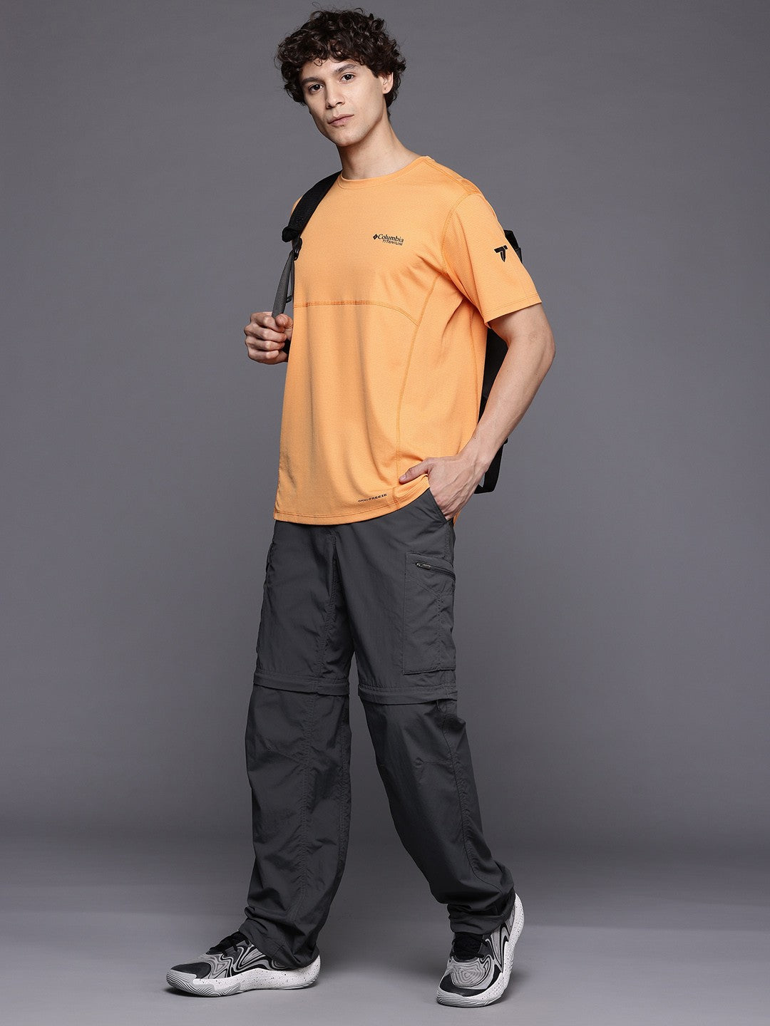 A Men Wearing Columbia Men Orange Cirque River Pro SS Crew (Sun Protection)