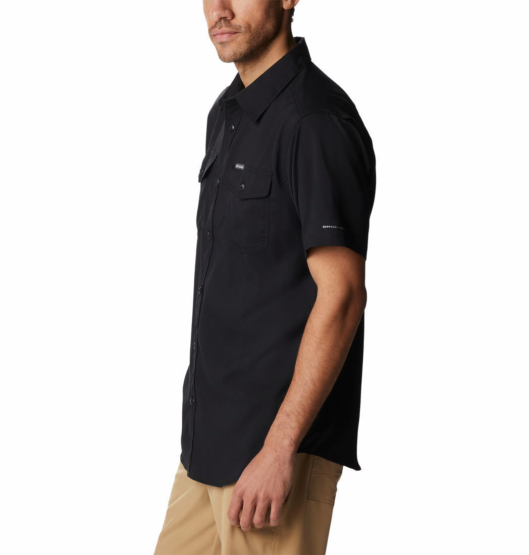 A Men Wearing Columbia Men Black Utilizer II Solid Short Sleeve Shirt (Sun Protection)