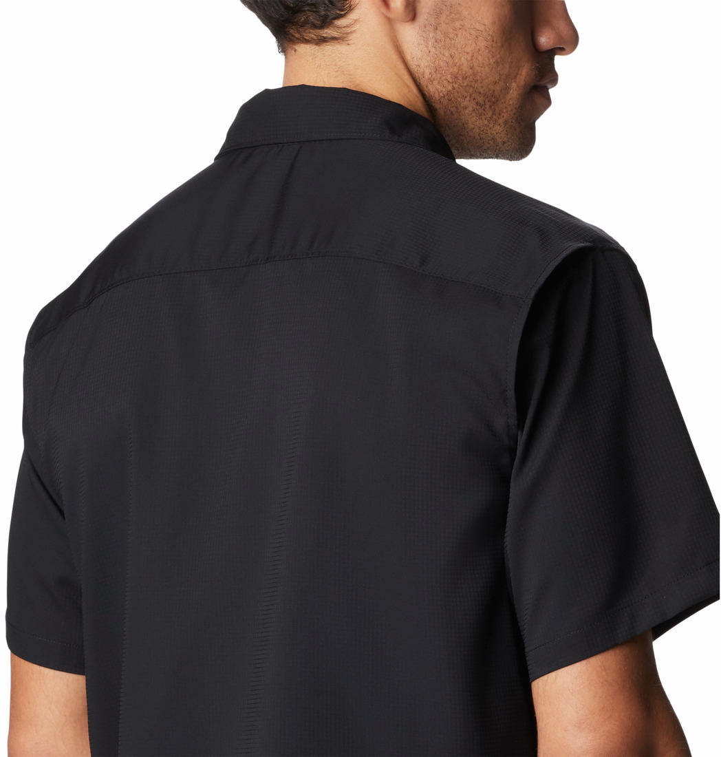 A Men Wearing Columbia Men Black Utilizer II Solid Short Sleeve Shirt (Sun Protection)