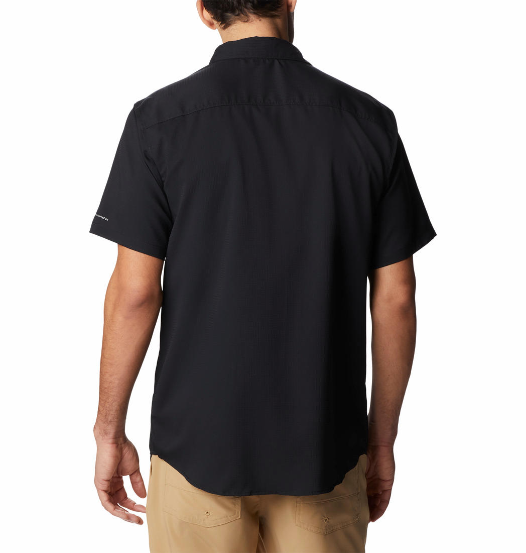 A Men Wearing Columbia Men Black Utilizer II Solid Short Sleeve Shirt (Sun Protection)