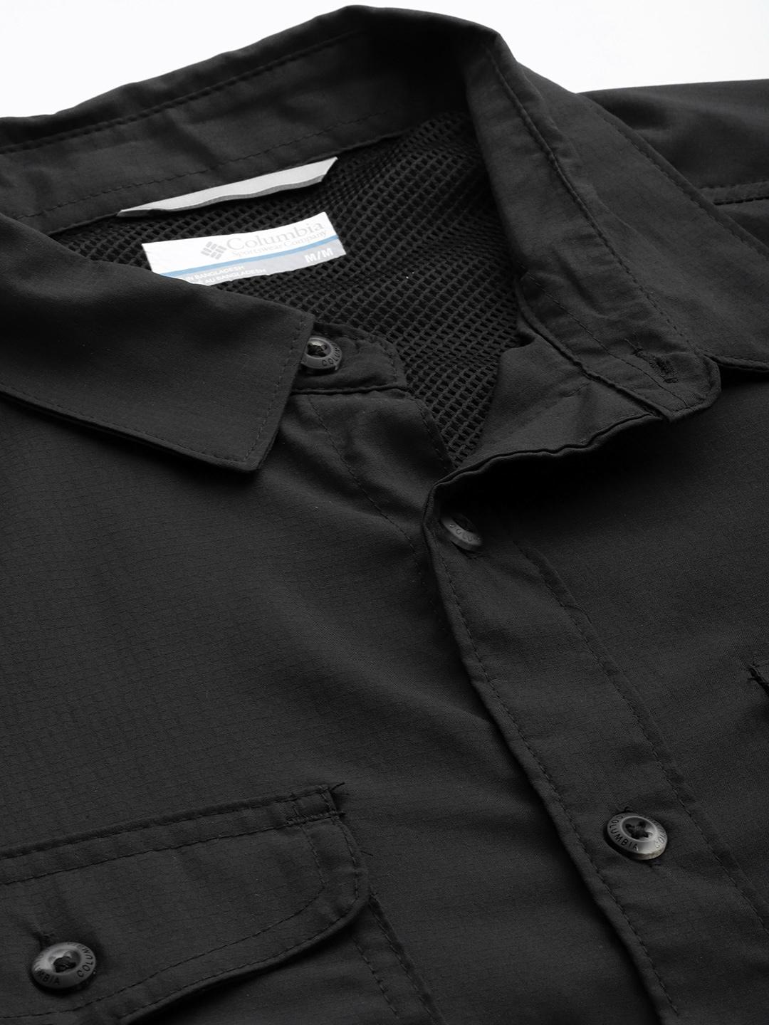 A Men Wearing Columbia Men Black Utilizer II Solid Short Sleeve Shirt (Sun Protection)