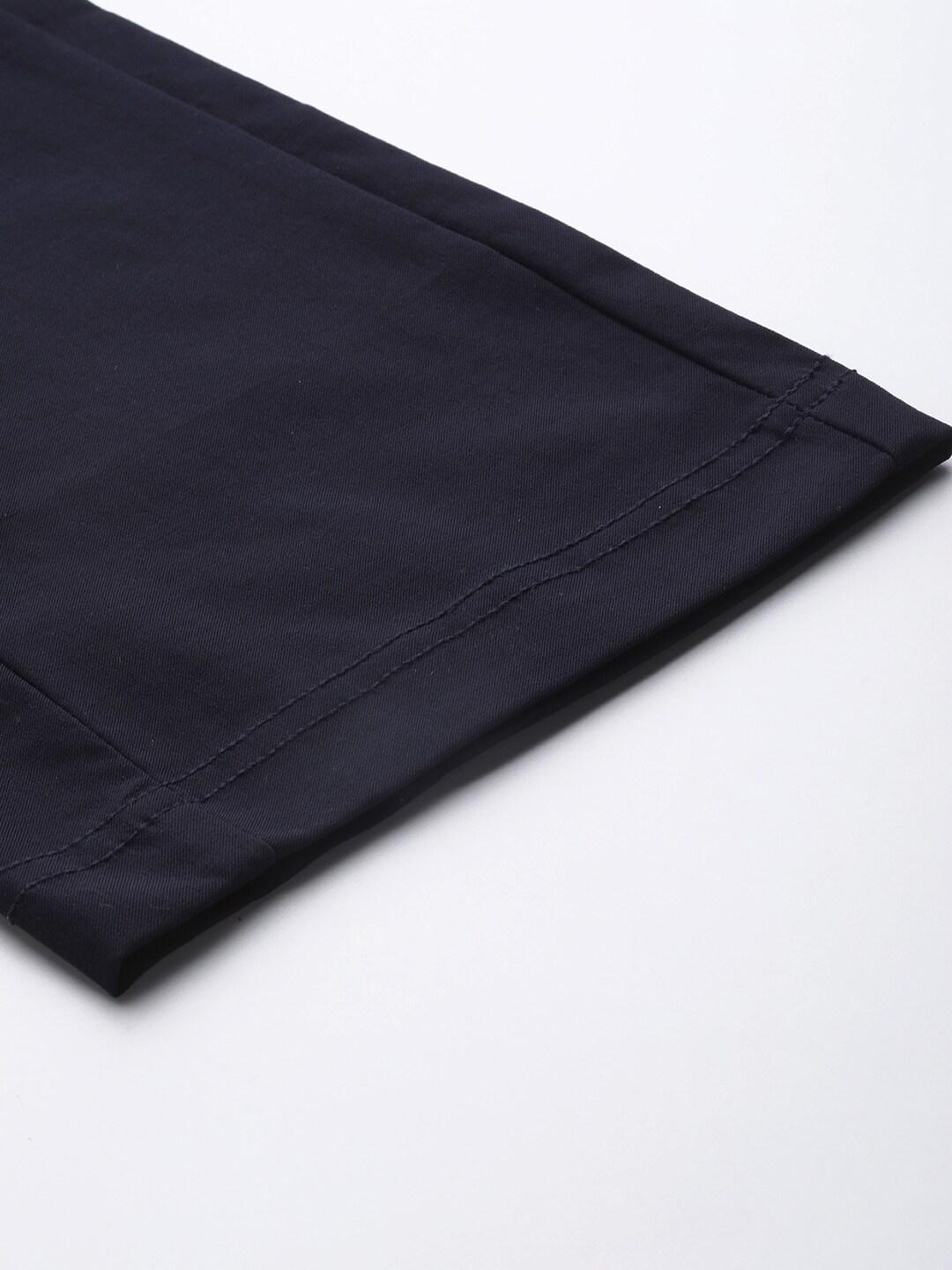 A Women Wearing Columbia Women Navy Blue Firwood Core Pant (Sun Protection)