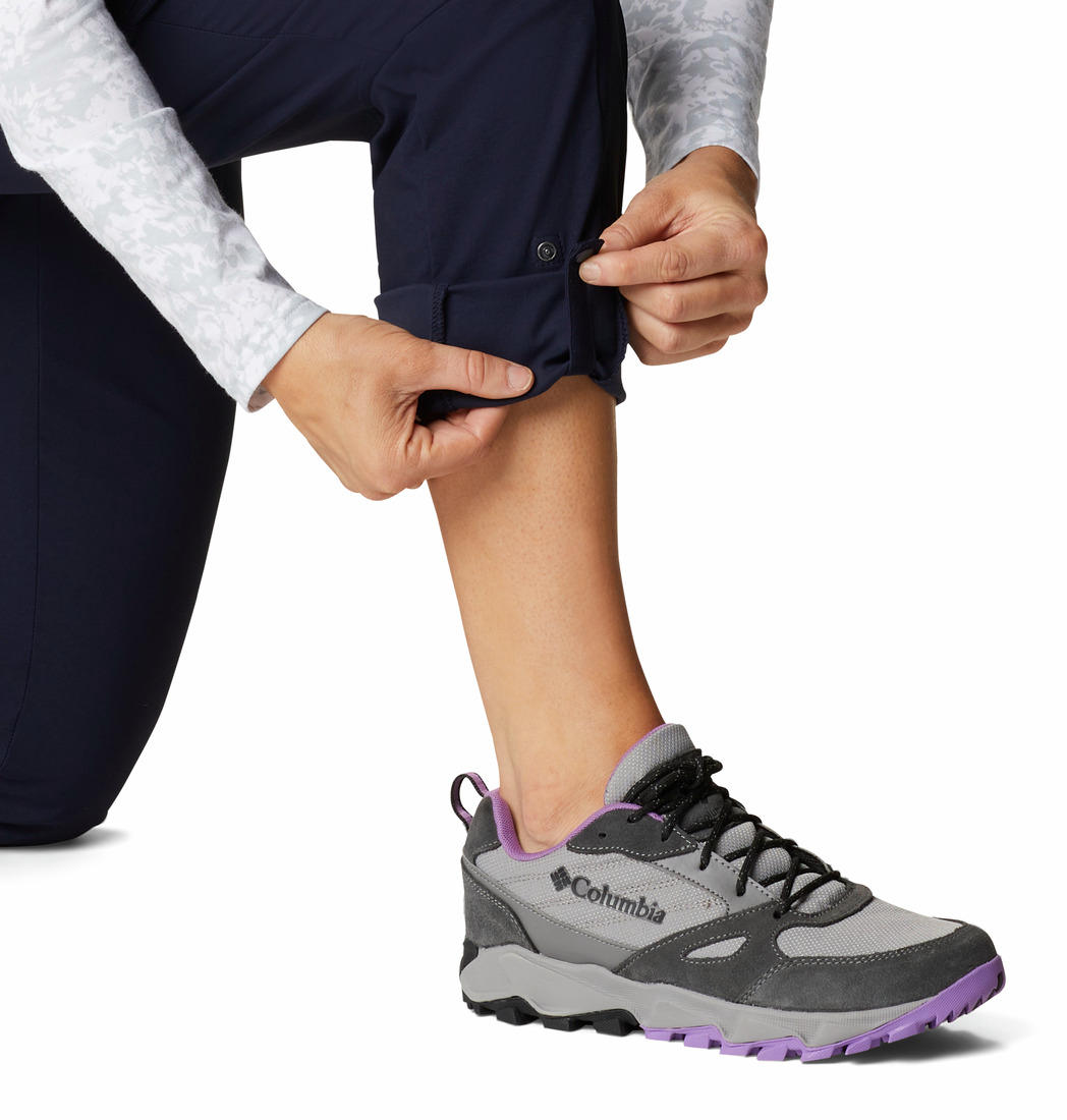 A Women Wearing Columbia Women Navy Blue Firwood Core Pant (Sun Protection)