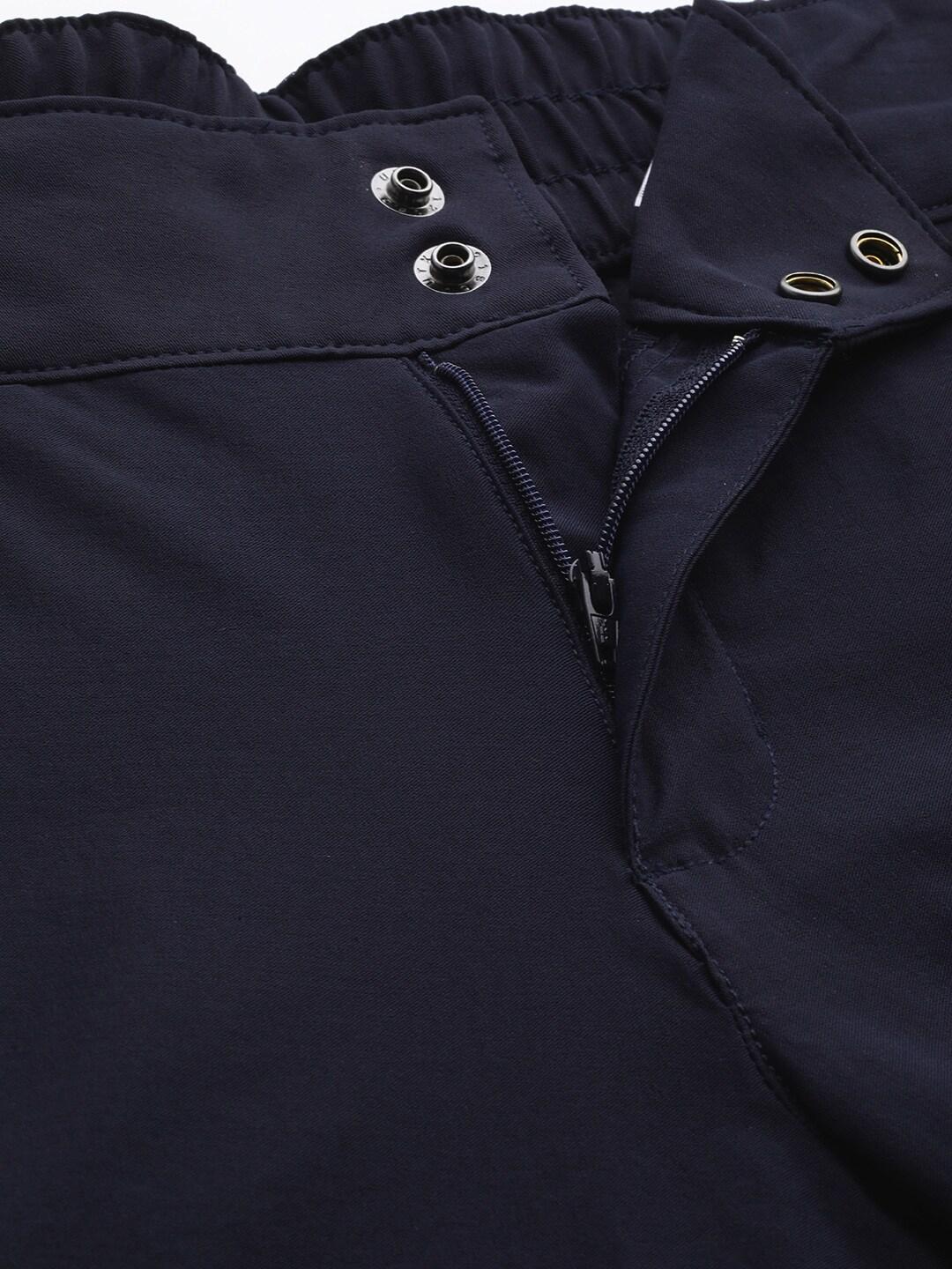 A Women Wearing Columbia Women Navy Blue Firwood Core Pant (Sun Protection)