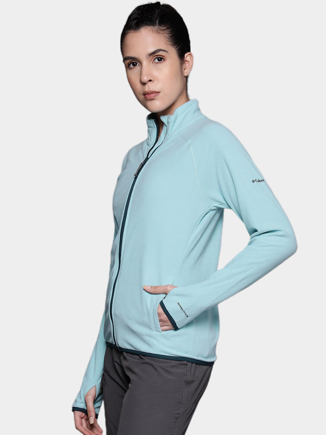 A Women Wearing Columbia Women Blue Back Beauty Full Zip