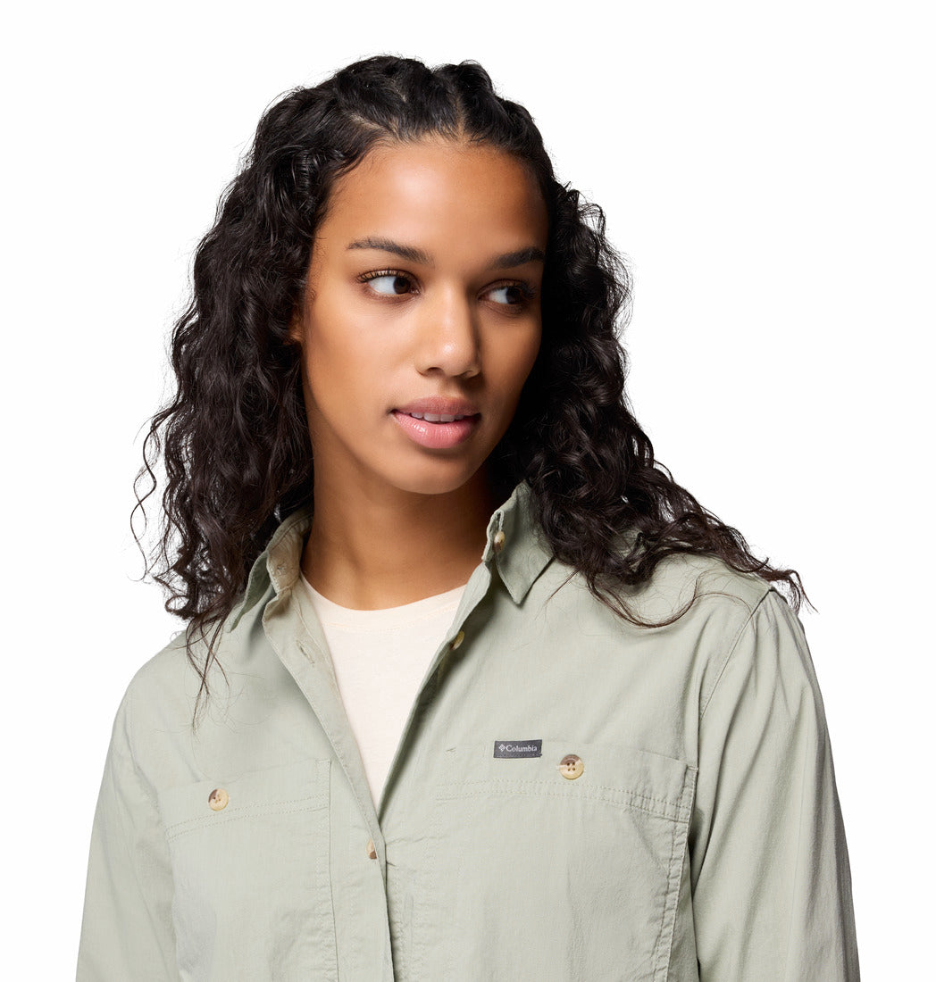 A Women Wearing Columbia Women Green Brea Falls Woven LS