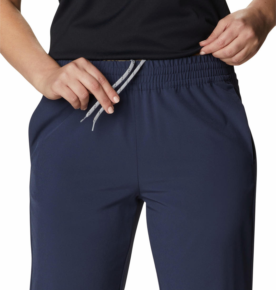 A Women Wearing Columbia Women Navy Blue Columbia Hike Pant (Sun Protection)