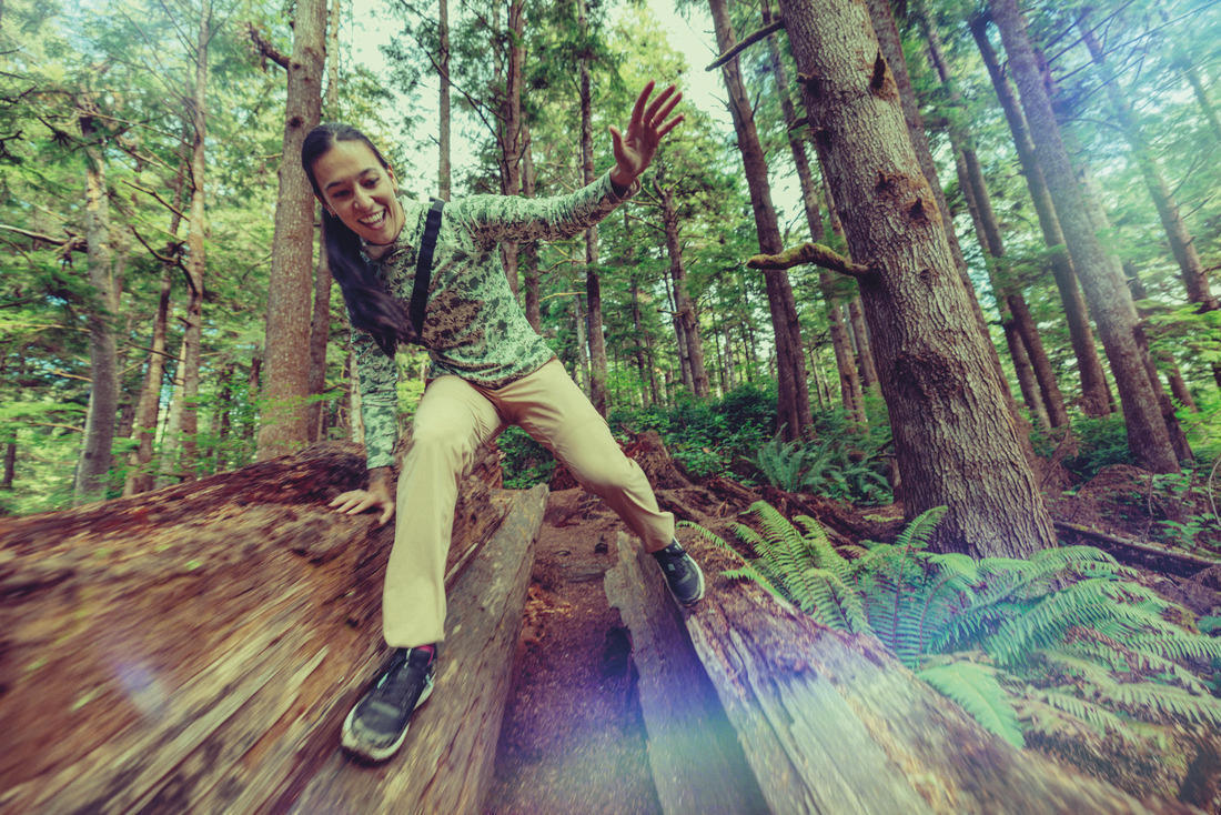 A Women Wearing Columbia Women Green Summit Valley Hoodie (Sun Protection)