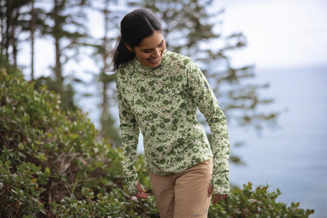 A Women Wearing Columbia Women Green Summit Valley Hoodie (Sun Protection)