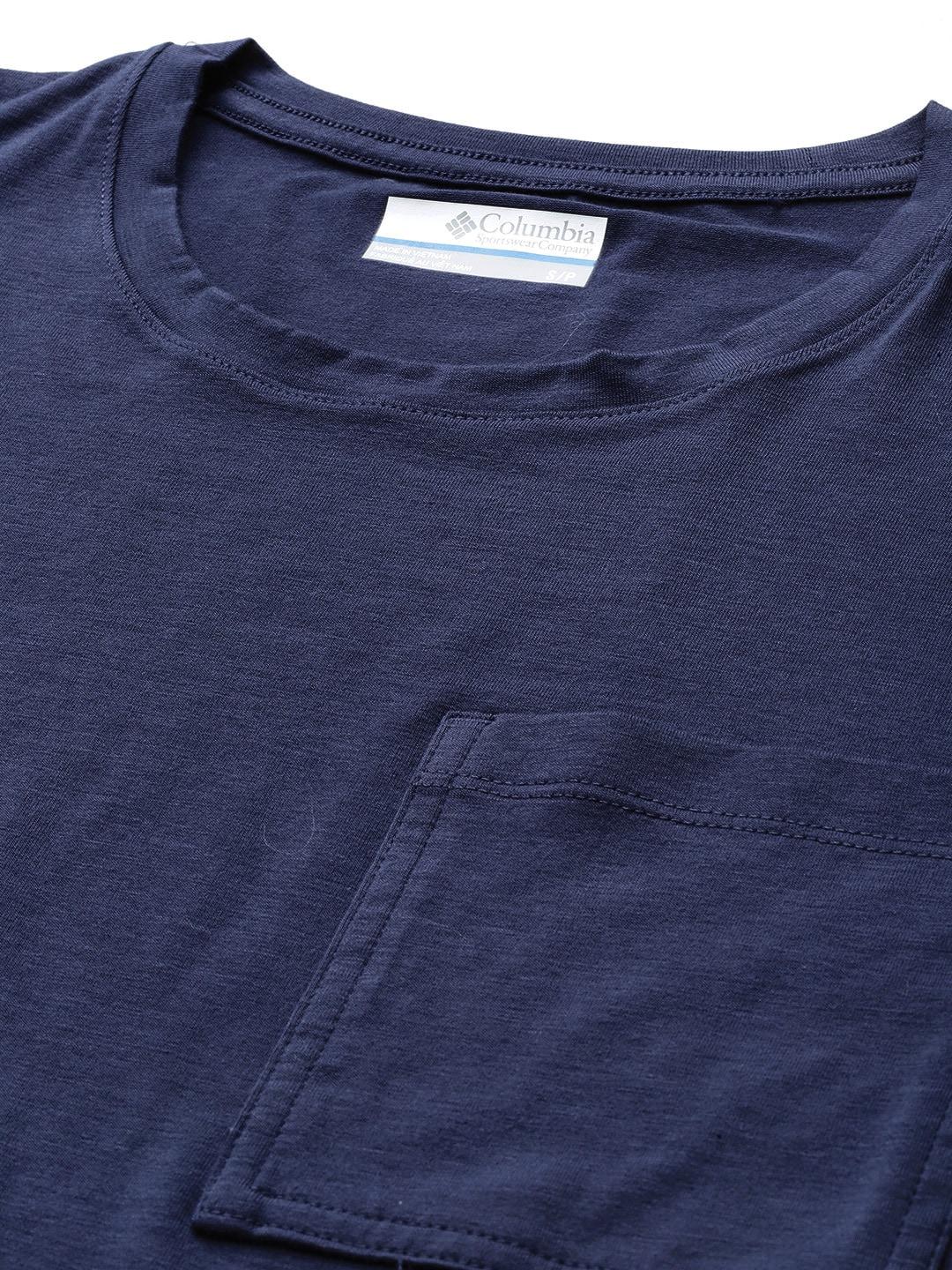 A Women Wearing Columbia Women Navy Blue Boundless Trek Short Sleeve Tee