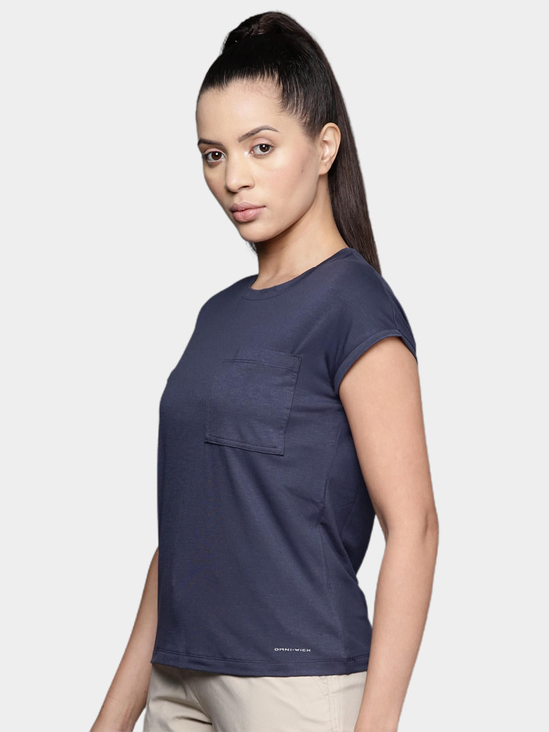 A Women Wearing Columbia Women Navy Blue Boundless Trek Short Sleeve Tee