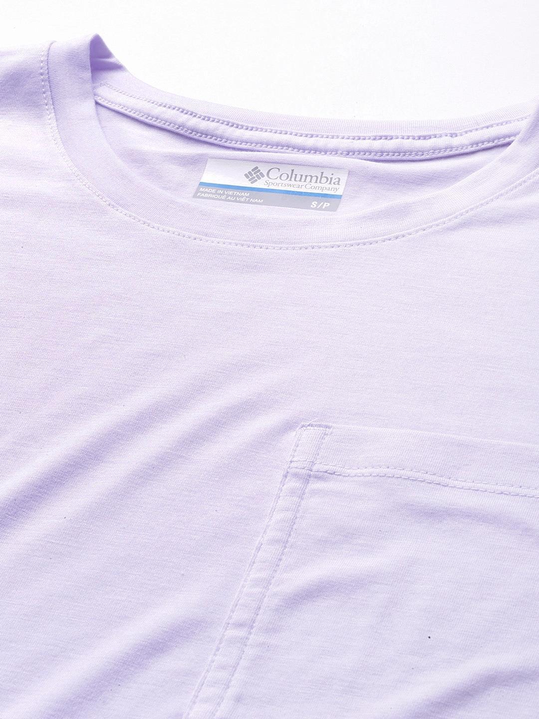 A Women Wearing Columbia Women Purple Boundless Trek Short Sleeve Tee