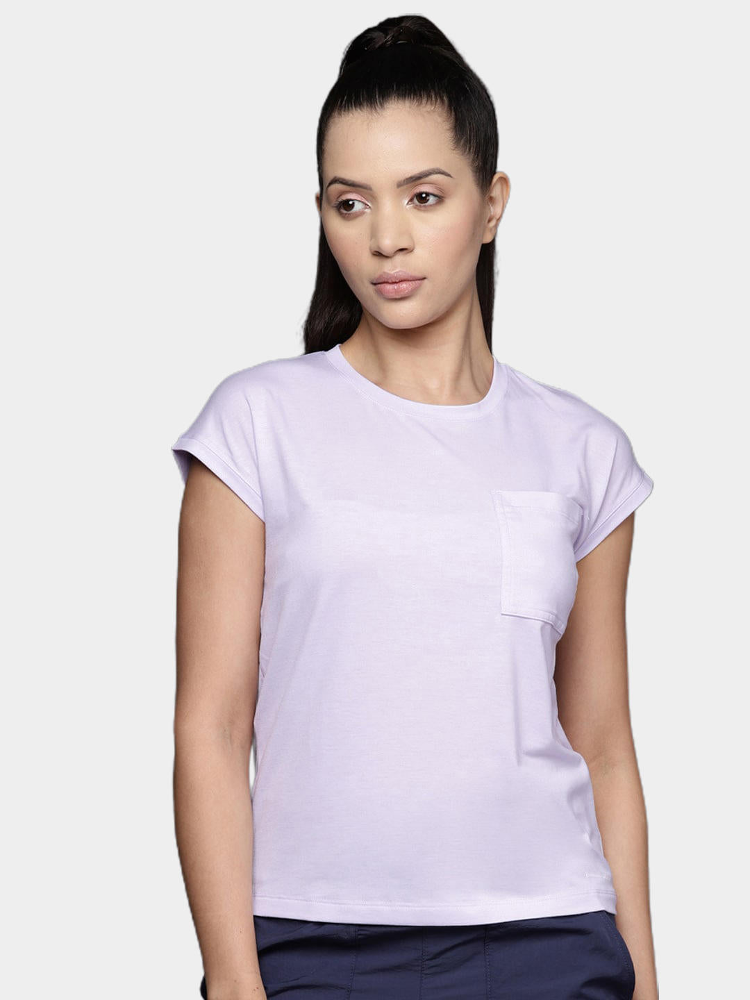 A Women Wearing Columbia Women Purple Boundless Trek Short Sleeve Tee
