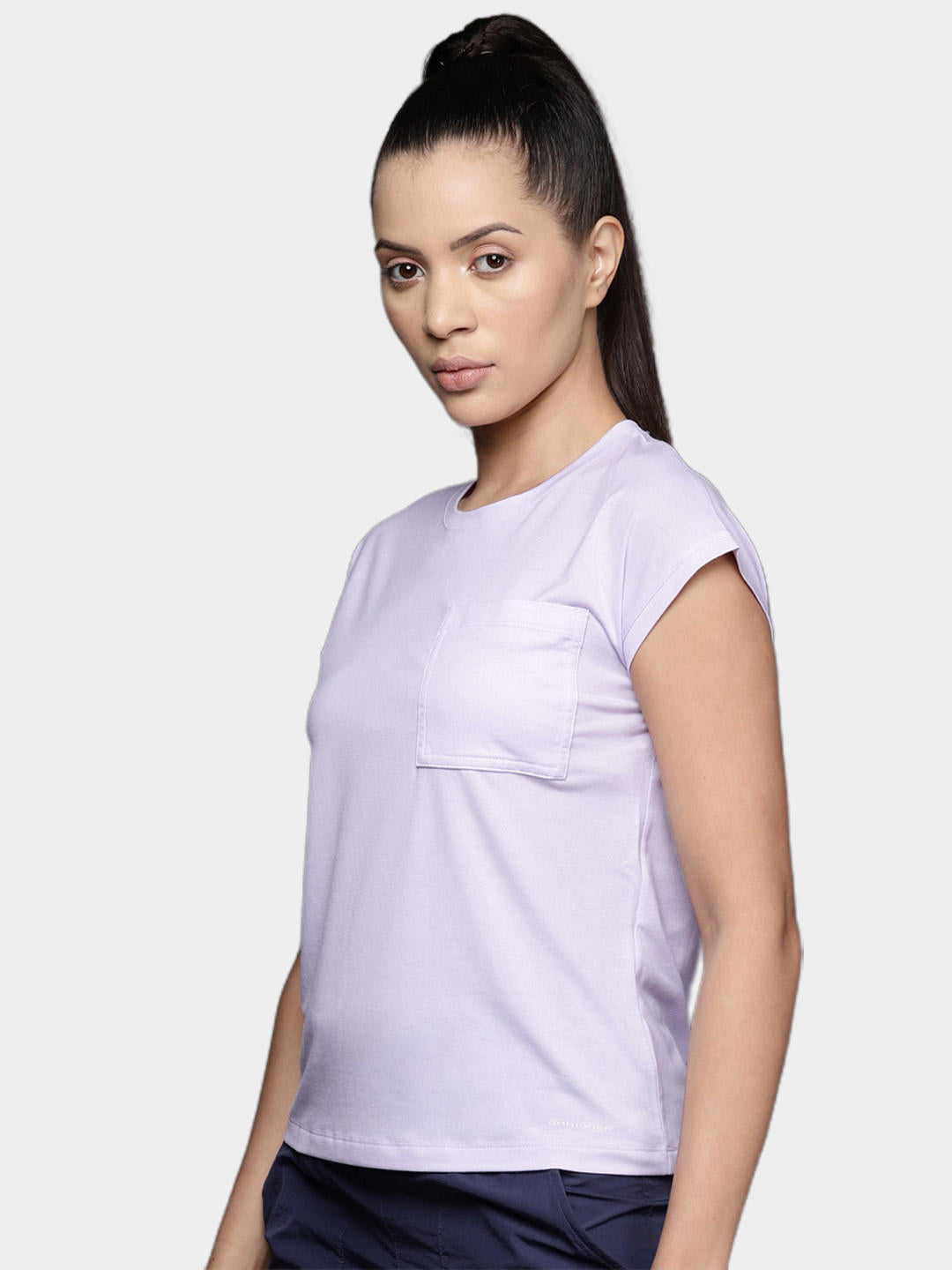 A Women Wearing Columbia Women Purple Boundless Trek Short Sleeve Tee