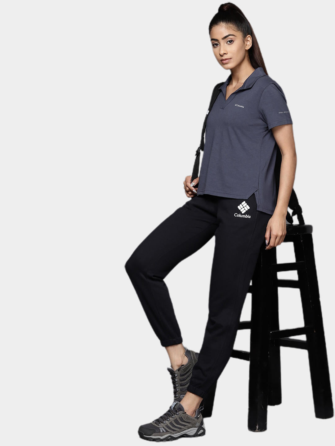 A Women Wearing Columbia Women Navy Blue W Sun Trek Polo (Sun Protection)