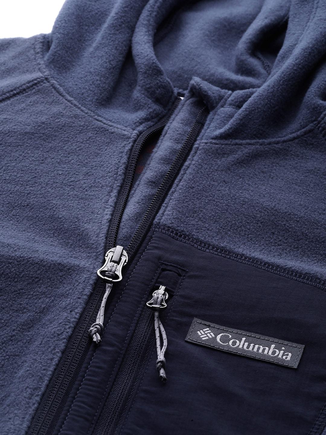 A Women Wearing Columbia Women Navy Blue W Outdoor Tracks Hooded FZ