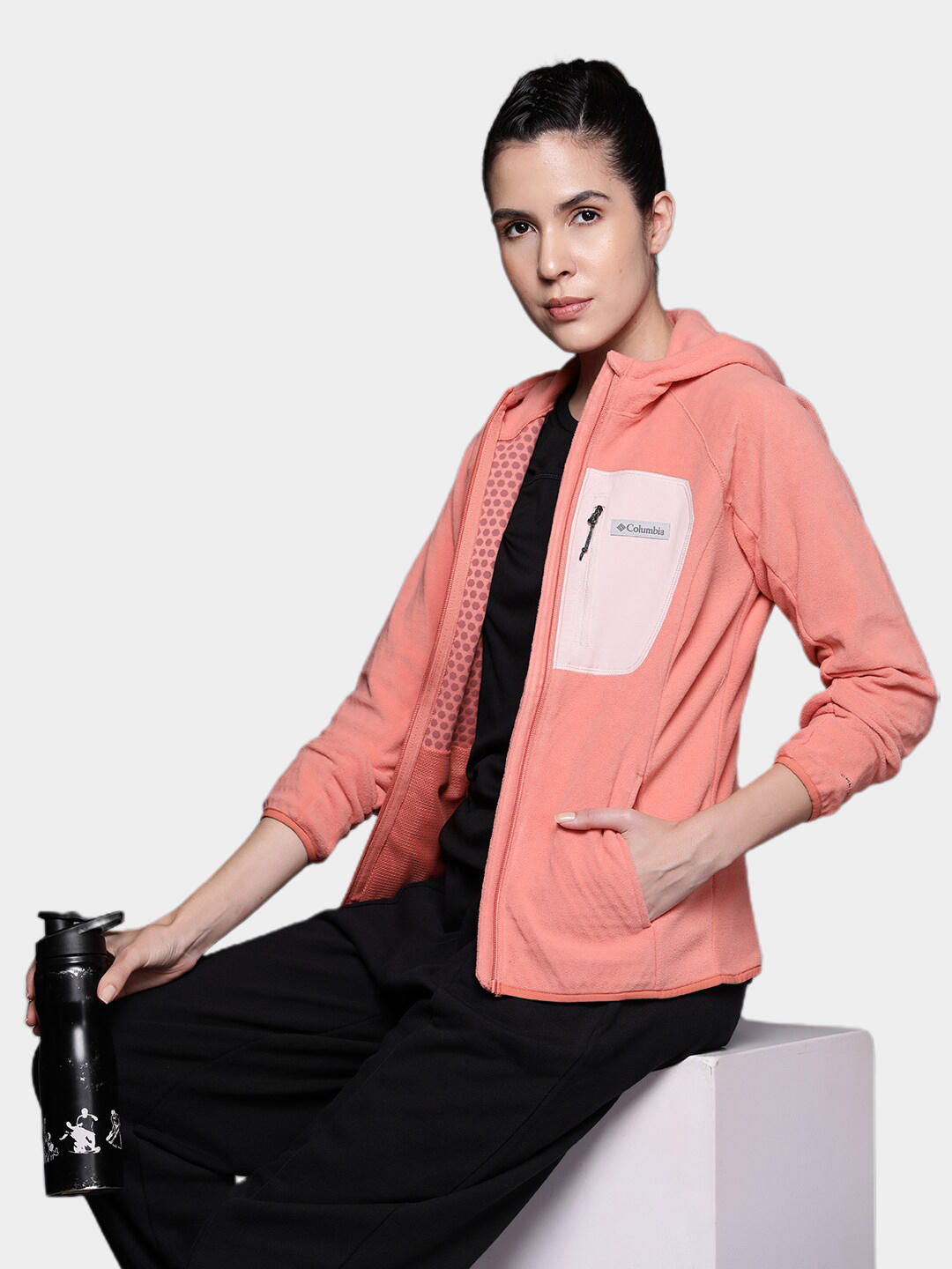 A Women Wearing Columbia Women Orange W Outdoor Tracks Hooded FZ