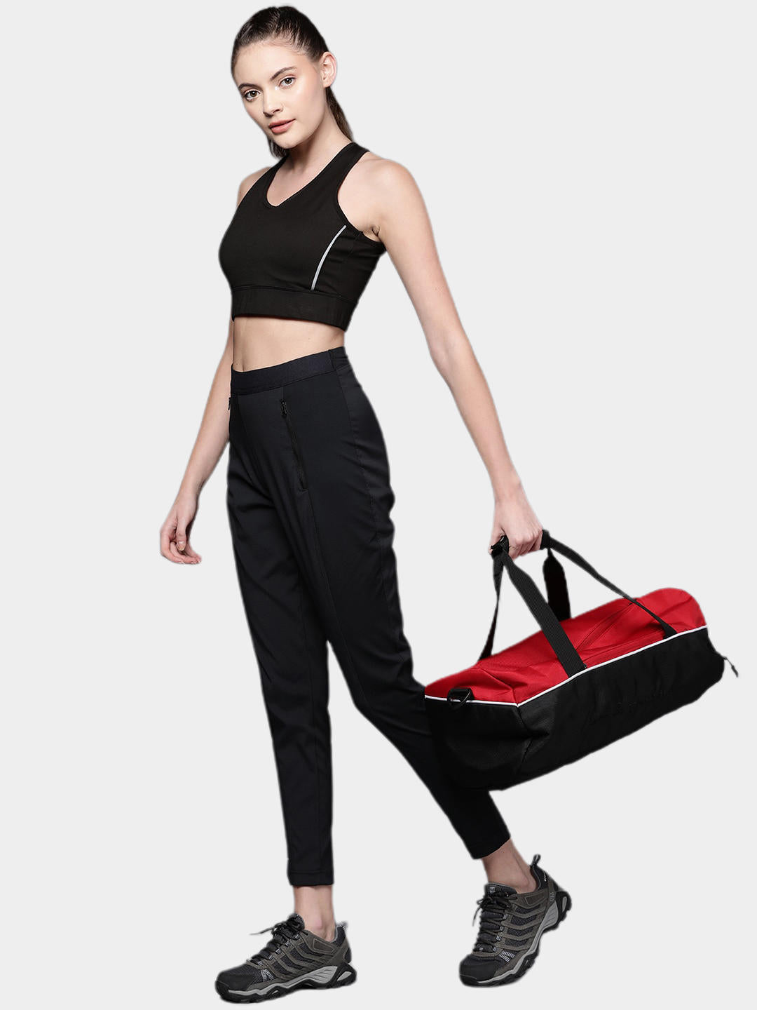 A Women Wearing Columbia Women Black On The Go Hybrid Pant (Sun Protection)