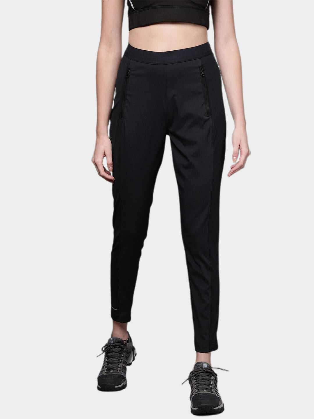 A Women Wearing Columbia Women Black On The Go Hybrid Pant (Sun Protection)
