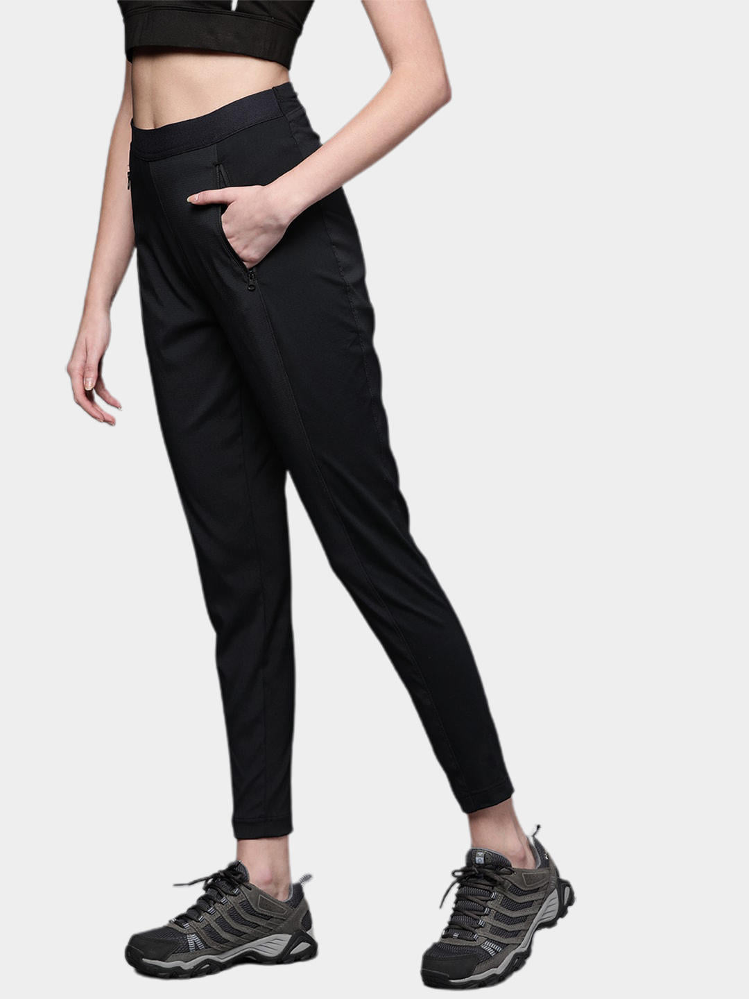 A Women Wearing Columbia Women Black On The Go Hybrid Pant (Sun Protection)