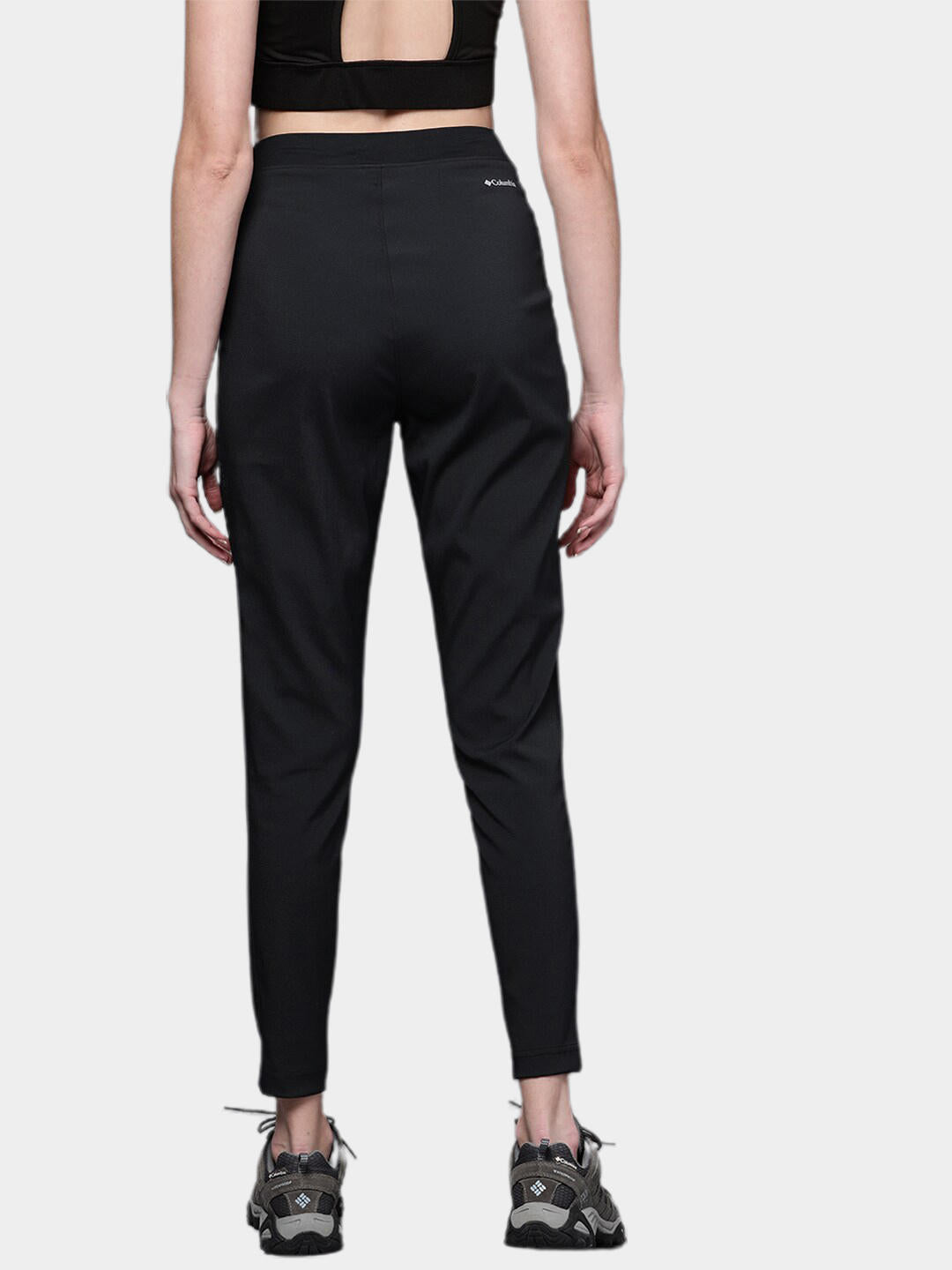 A Women Wearing Columbia Women Black On The Go Hybrid Pant (Sun Protection)