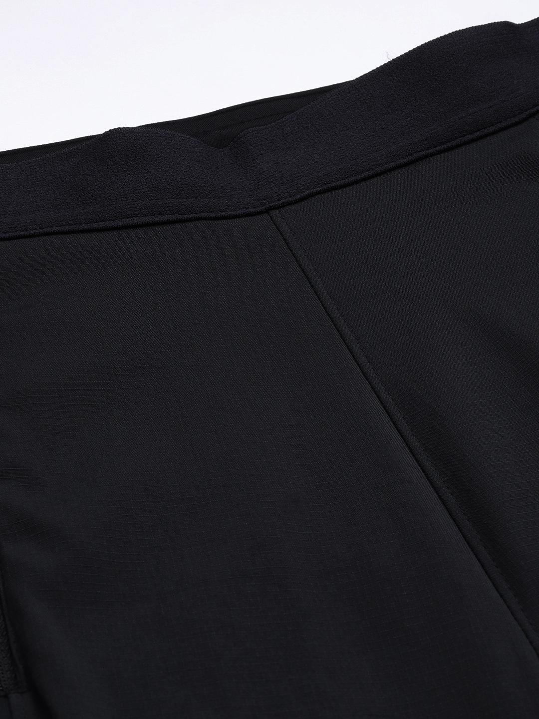 A Women Wearing Columbia Women Black On The Go Hybrid Pant (Sun Protection)