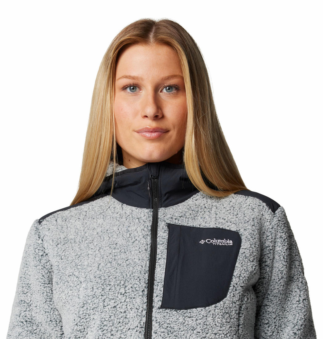 A Women Wearing Columbia Women White Arctic Crest Sherpa Full Zip