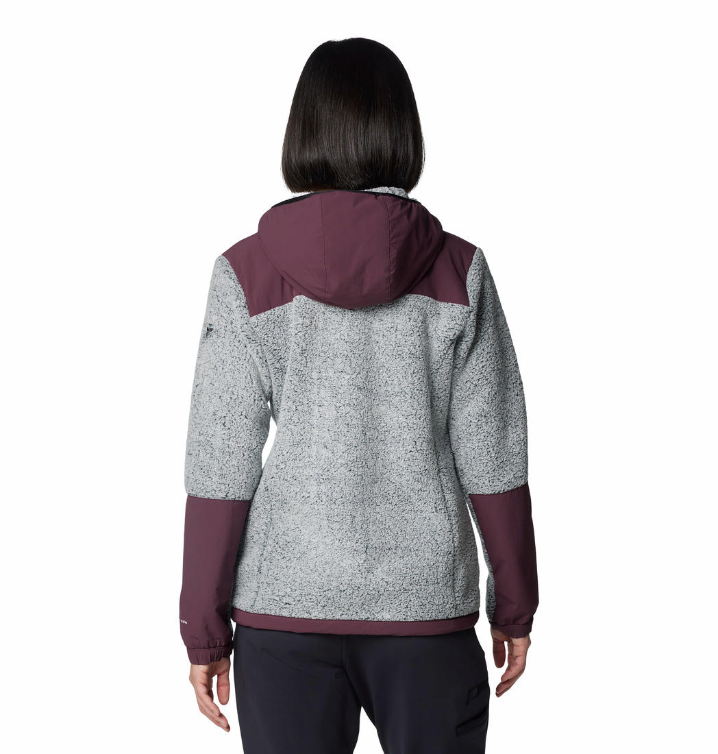 A Women Wearing Columbia Women Red Arctic Crest Sherpa Full Zip