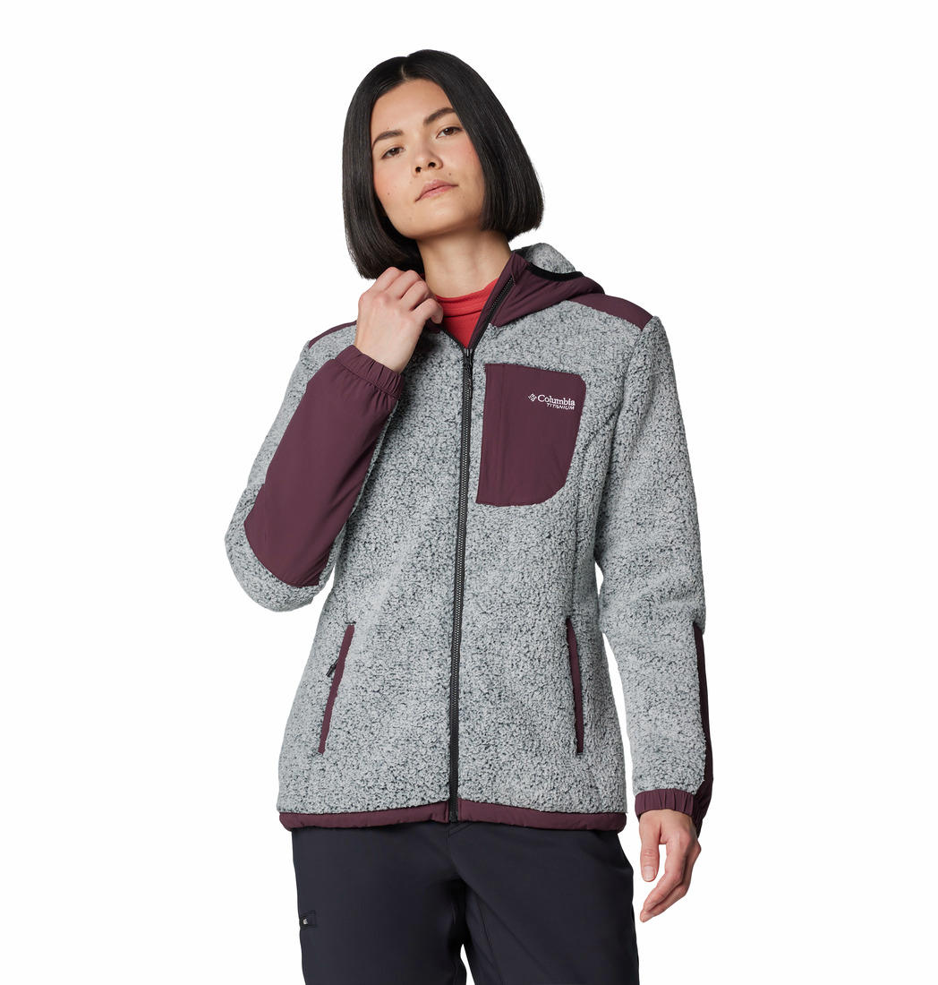 A Women Wearing Columbia Women Red Arctic Crest Sherpa Full Zip