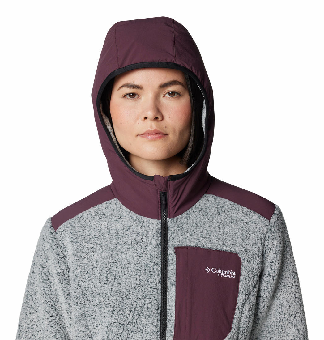 A Women Wearing Columbia Women Red Arctic Crest Sherpa Full Zip