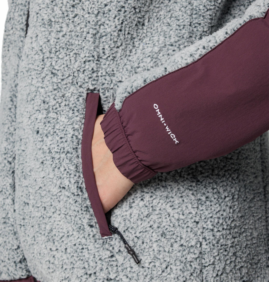 A Women Wearing Columbia Women Red Arctic Crest Sherpa Full Zip