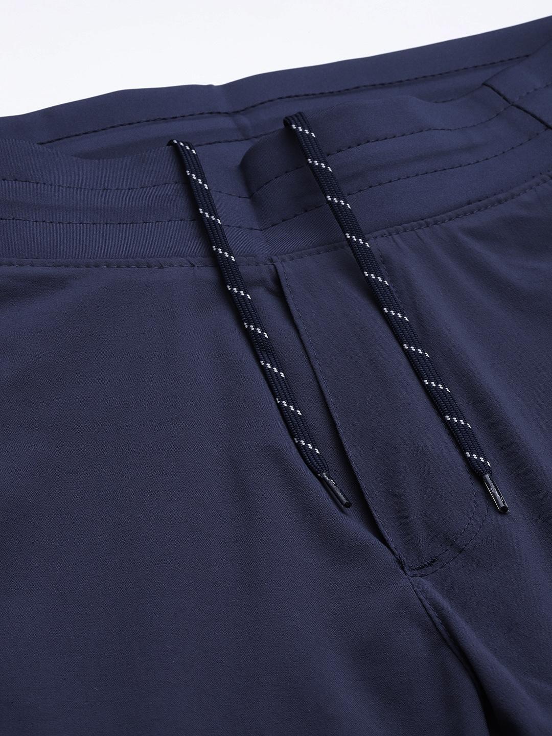 A Women Wearing Columbia Women Navy Blue Claudia Ridge Pant