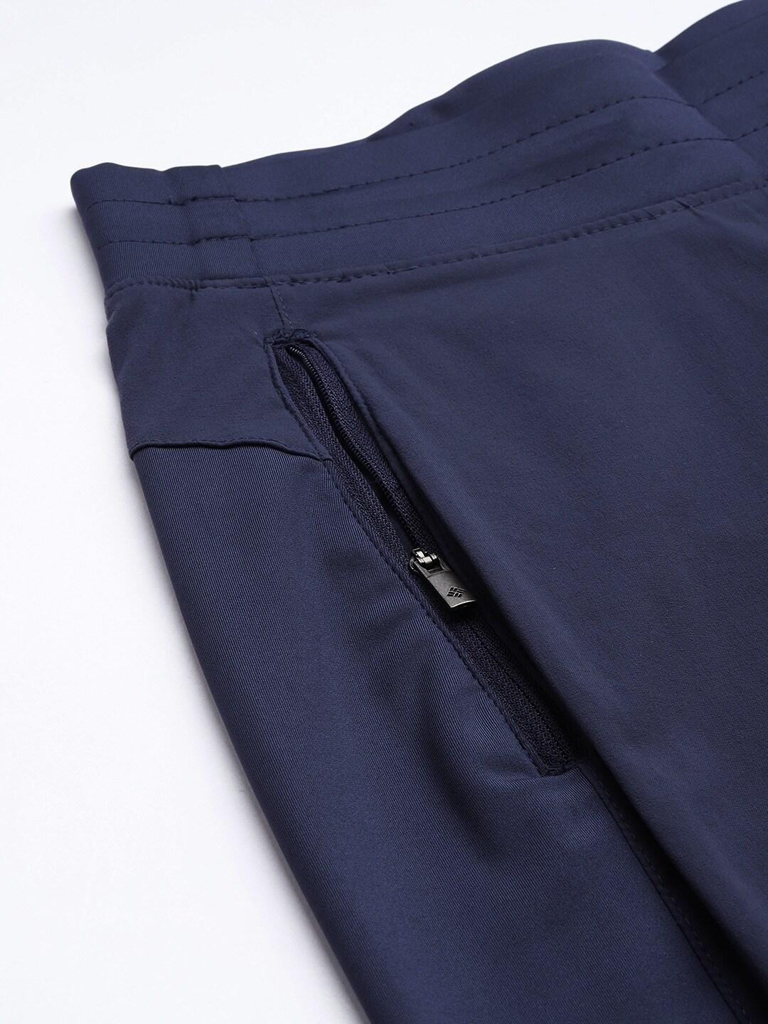 A Women Wearing Columbia Women Navy Blue Claudia Ridge Pant