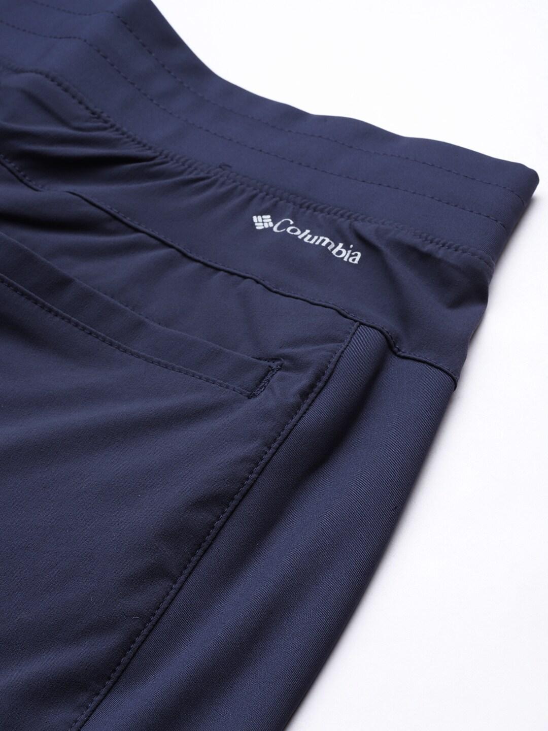 A Women Wearing Columbia Women Navy Blue Claudia Ridge Pant