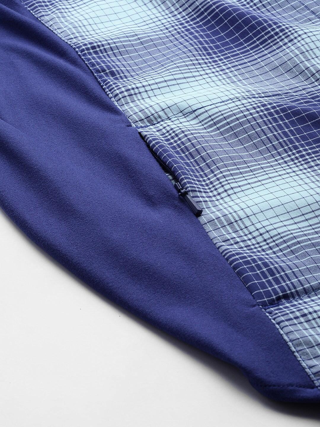 A Women Wearing Columbia Women Blue Claudia Ridge LS Shirt