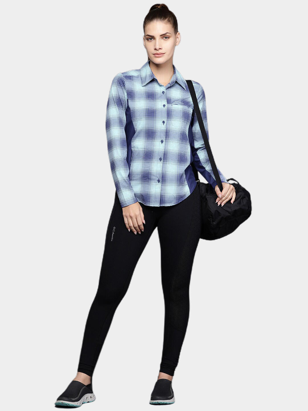 A Women Wearing Columbia Women Blue Claudia Ridge LS Shirt