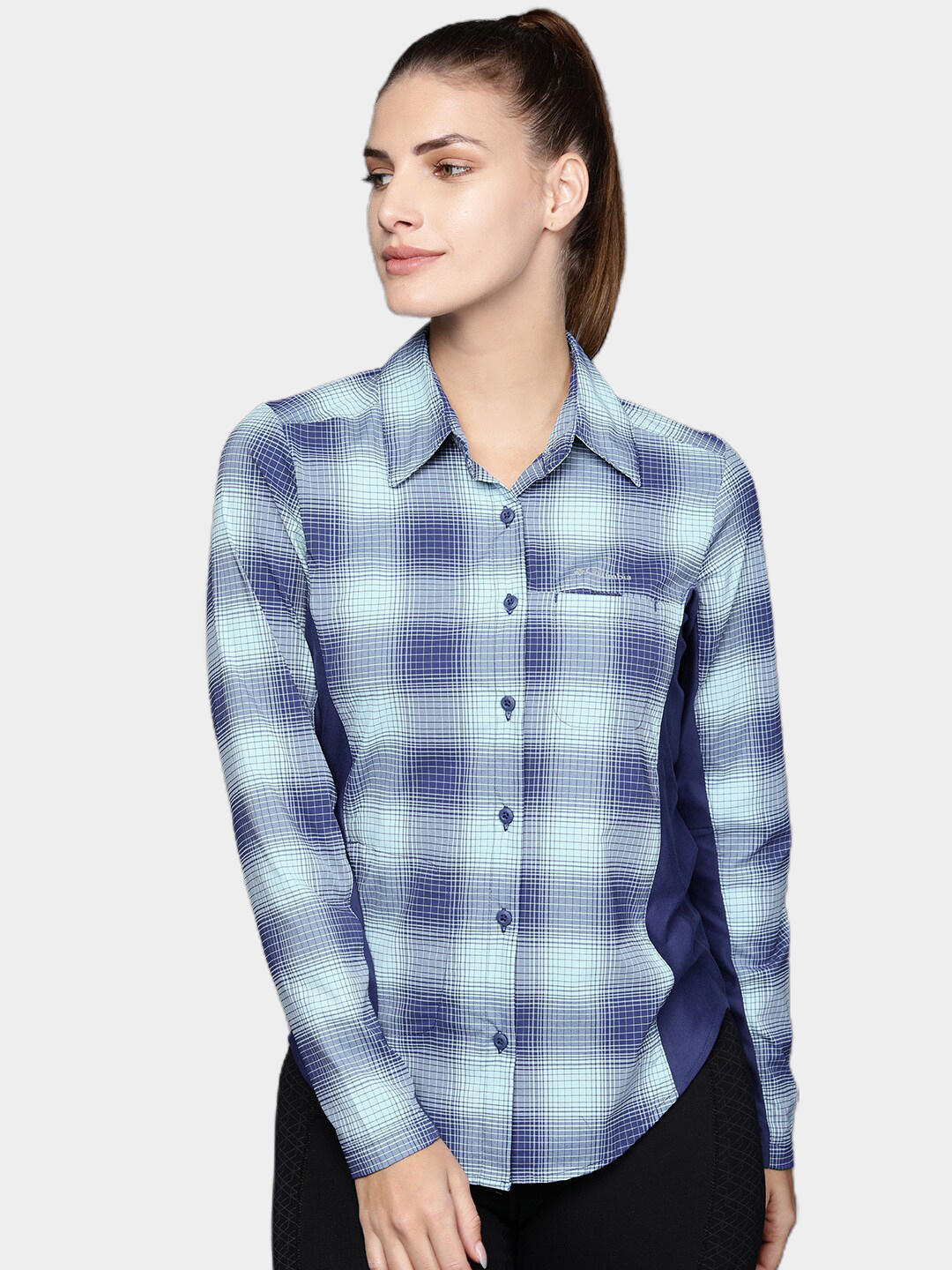 A Women Wearing Columbia Women Blue Claudia Ridge LS Shirt