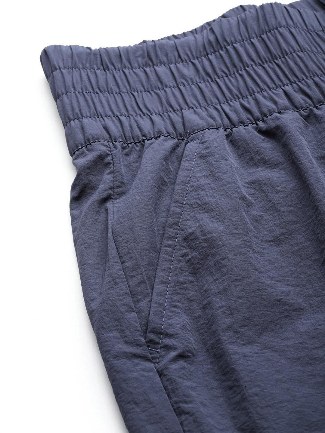 A Women Wearing Columbia Women Navy Blue Boundless Trek Jogger