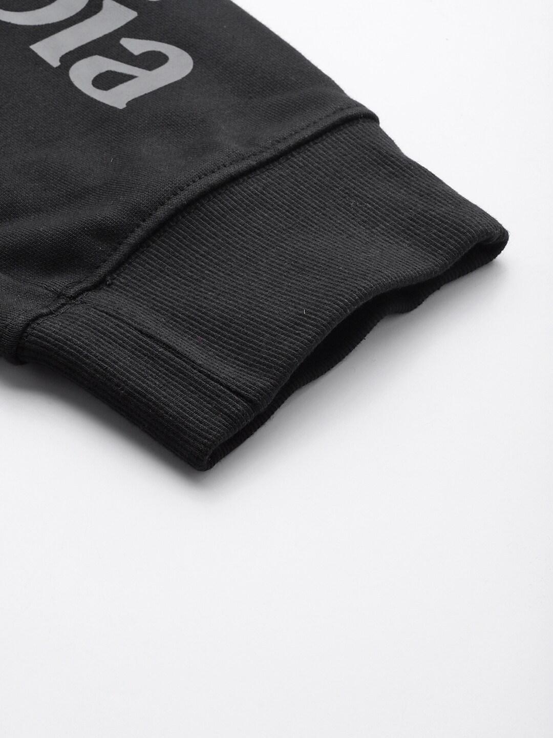 A Men Wearing Columbia Men Black M CSC Logo Fleece Jogger II