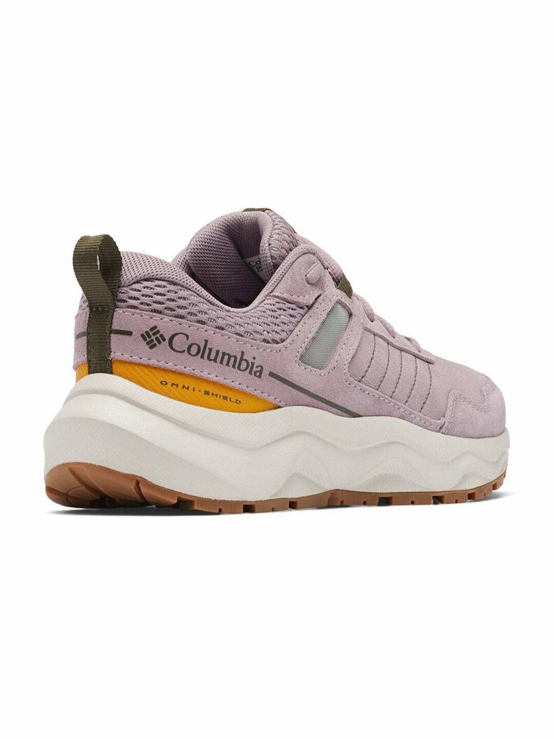 A Women Wearing Columbia Women Purple PLATEAU VENTURE