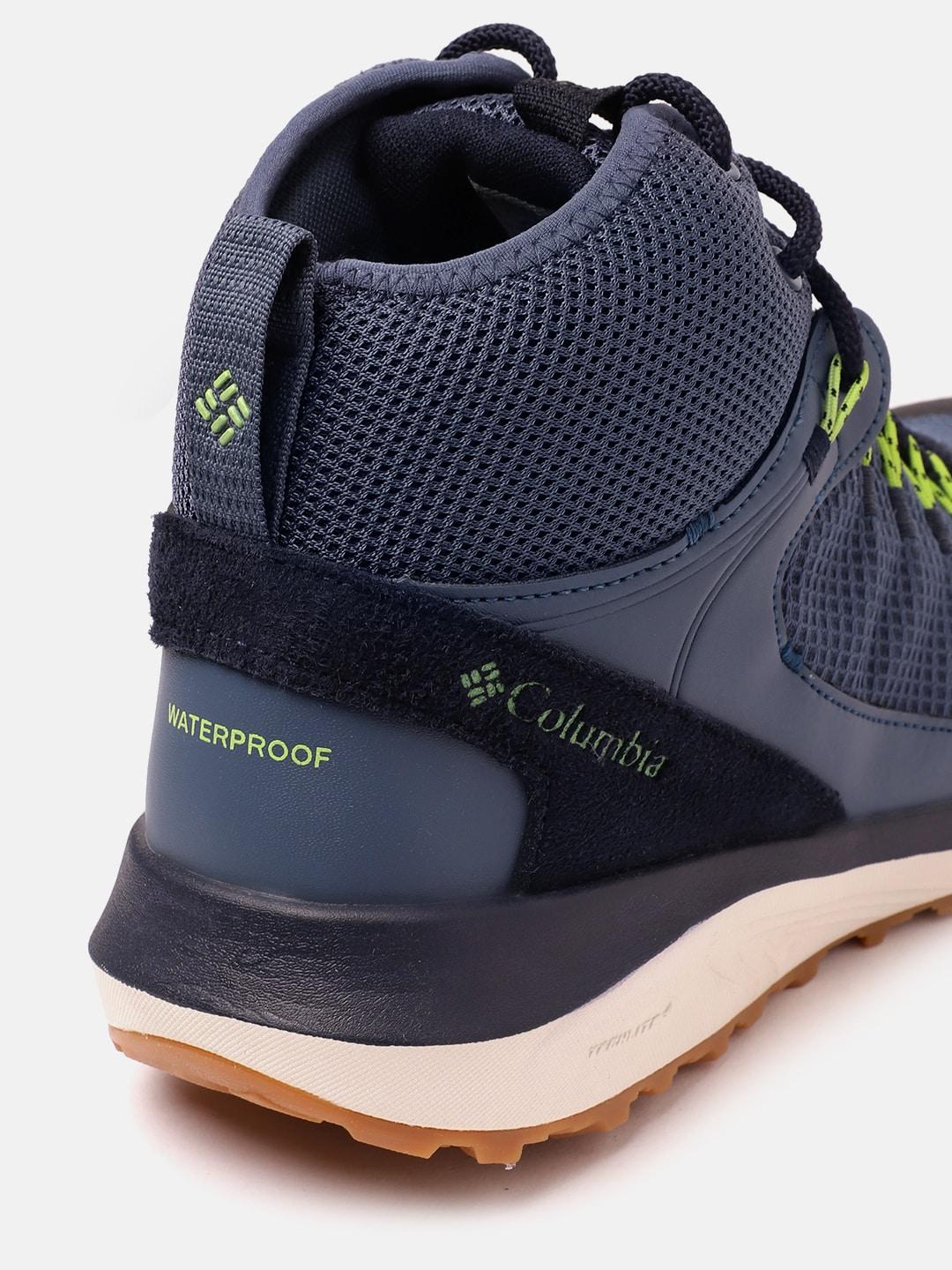 A Men Wearing Columbia Men Navy Blue TRAILSTORM MID WATERPROOF